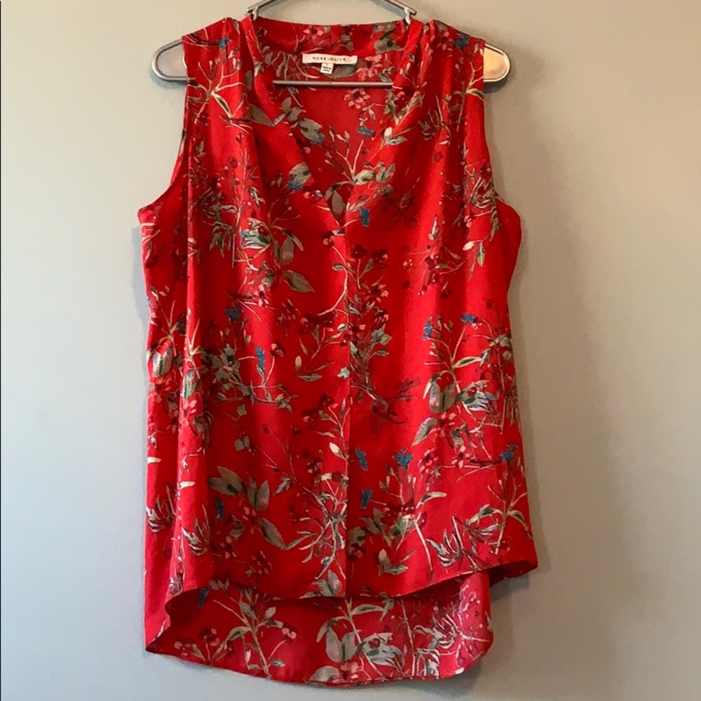 Red blouse with flower detail